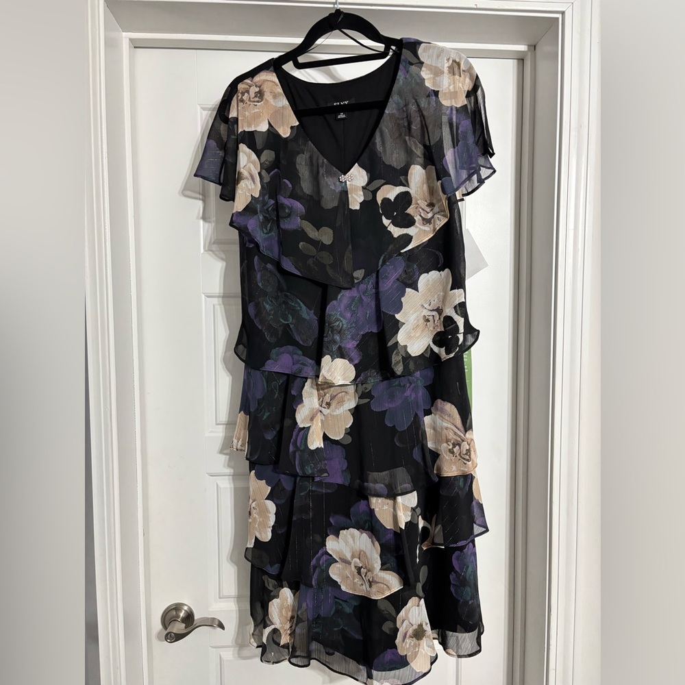 Black dress with tan, purple flowers, gold highlight running throughout. Size 14